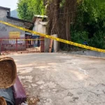 Lokasi penemuan mayat pria di Kali Sasak Ciputat yang dipasangi garis polisi